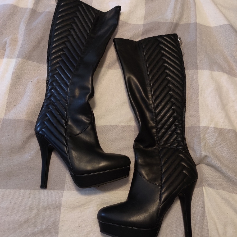 Knee high black boots